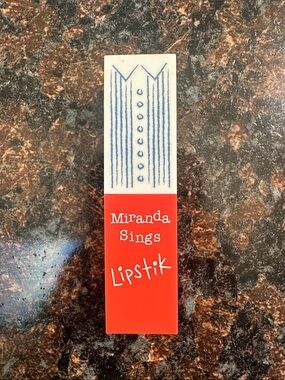 Miranda sings lipstick in Miranda red